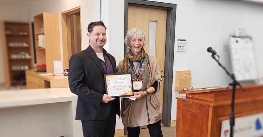 OrilliaMatters’ John Hammill is pictured with Valerie Powell, co-chair of Age-Friendly Orillia, who presented OrilliaMatters with an Age-Friendly Orillia Certificate of Appreciation